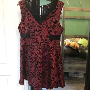 Wine/ Dark red colored mini dress.